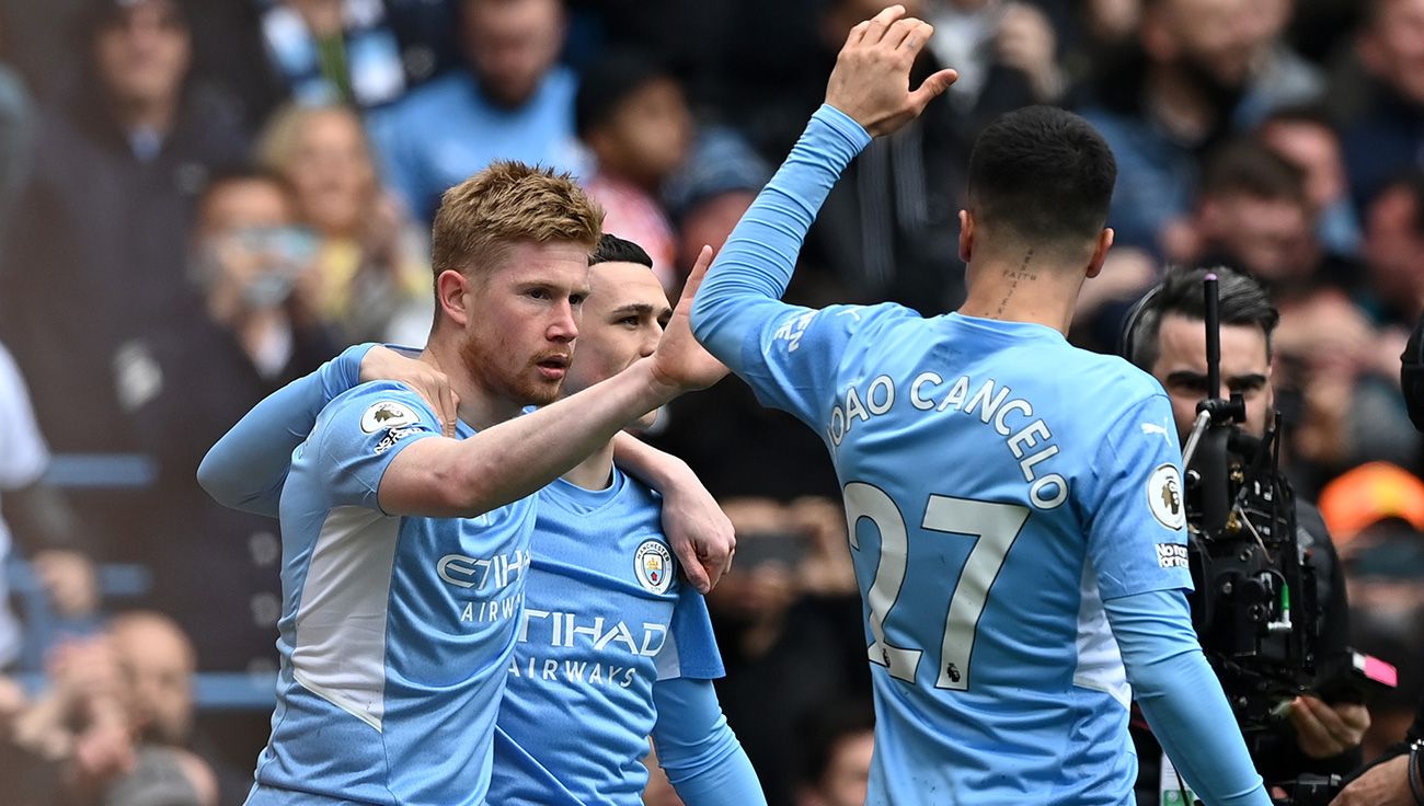 Kevin De Bruyne and Joao Cancelo celebrating a goal