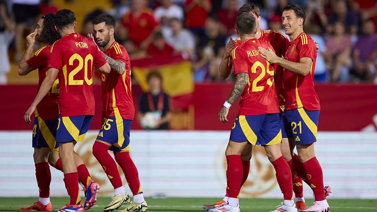 Spanish players celebrate one of Mikel Oyarzabal's goals against Andorra