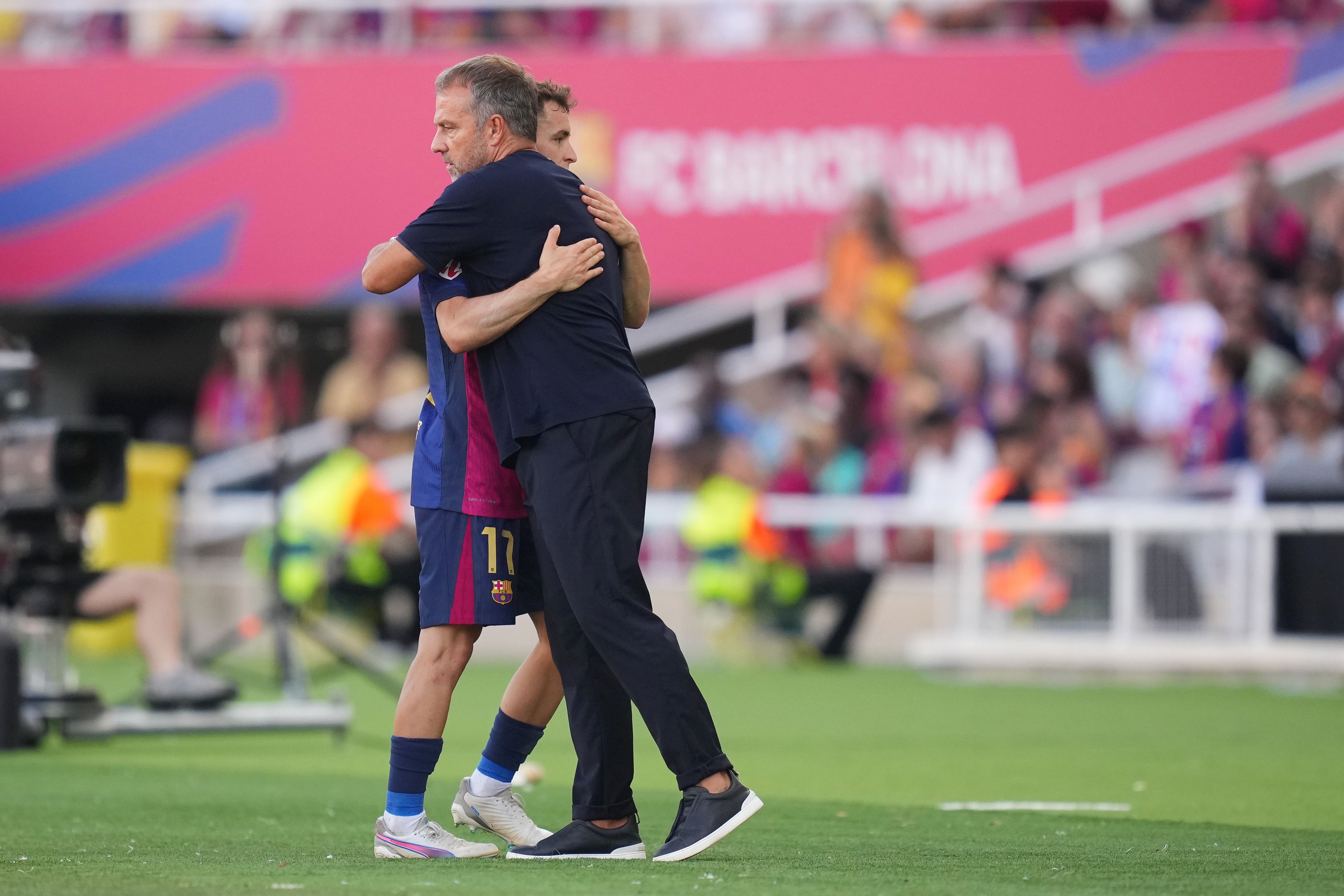 Marc Casadó y Hansi Flick en un partido del Barça