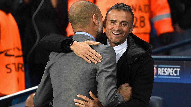 Pep Guardiola and Luis Enrique, embracing before a party